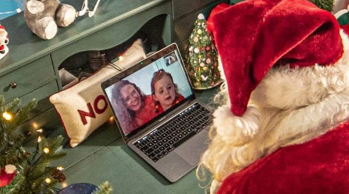 Santa Claus video calling kids on Zoom